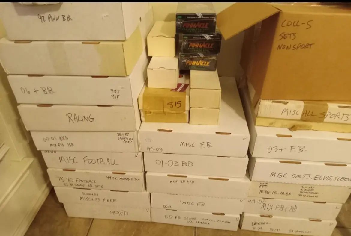 Stacked and labeled card boxes: misc football, baseball, racing and non-sport sets