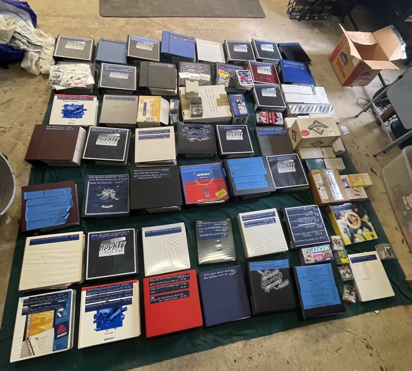Dozens of hockey card binders and complete sets from a full collection purchase
